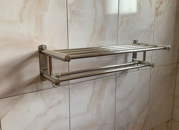 Bathroom Rack Installation in Marwa Heights.