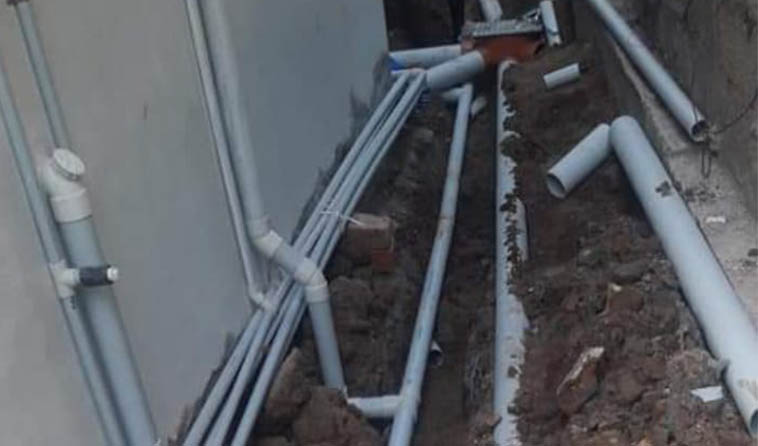 Laying drainage pipes for a construction site